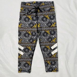 The Upside US Sz 6 Black Gold Capri Leggings